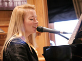 Laura performing at a wedding reception at the Hilton in Hampshire